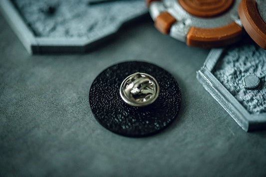 Sylop Pin – Minimalist 1-Inch Black Plated Enamel Pin