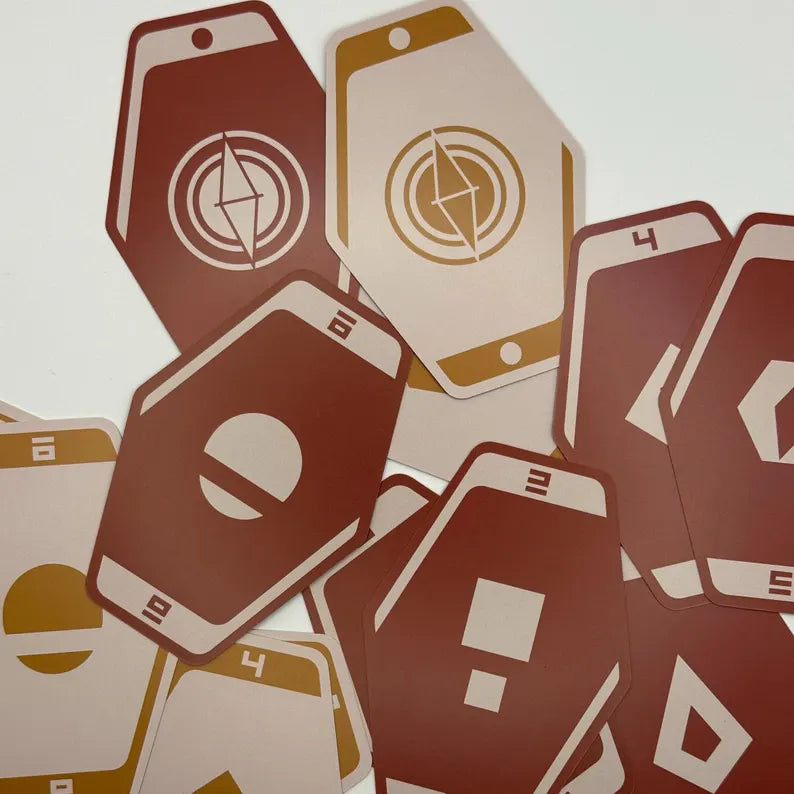 Assorted playing cards from the Sabacc-themed deck, displaying futuristic geometric symbols and numbered designs. High-quality collectible for Star Wars fans.